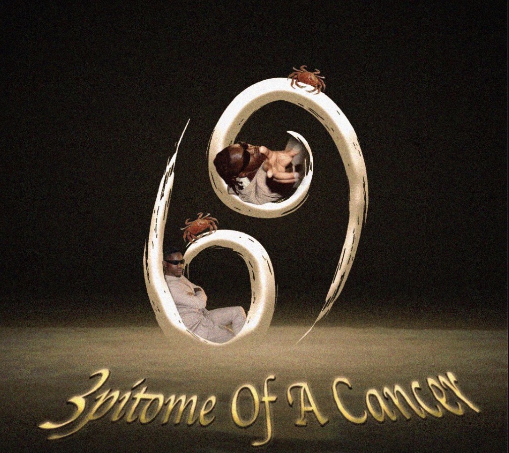 A large, stylized letter with two small creatures on top and inside, with text below reading 'Zitome Of A Concept'.