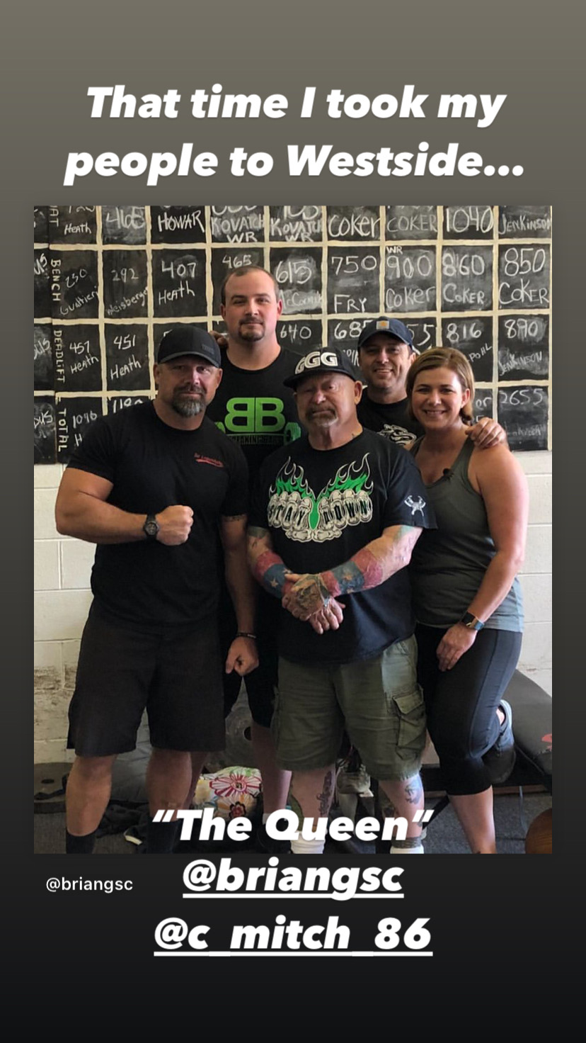 Four people standing together in front of a wall with writing, smiling, with text overlay about taking people to Westside.