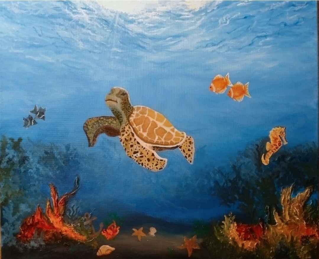 Underwater scene with a turtle, fish, and coral, against a blue ocean background.