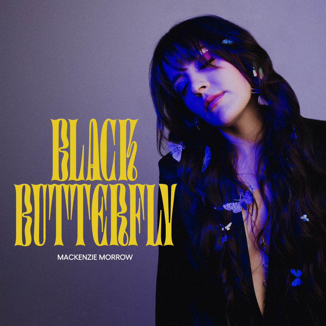 Portrait of a woman with long dark hair, wearing dark clothing, against a purple background, with yellow text reading 'Black Butterfly' and smaller text 'Mackenzie Morrow'.