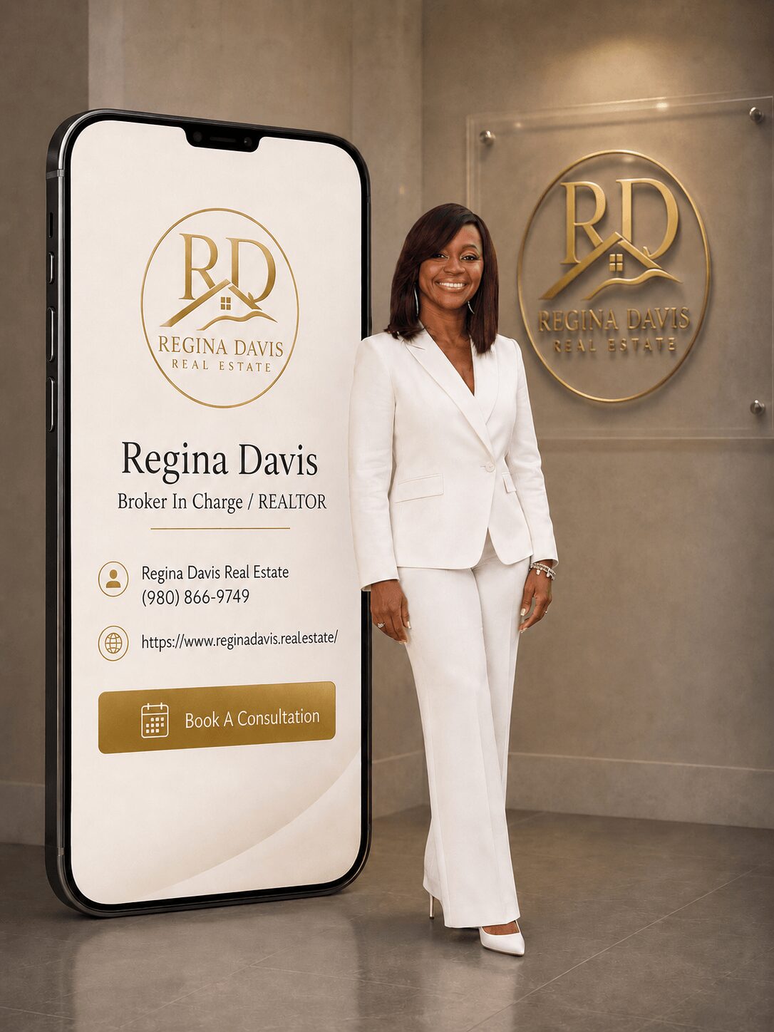 Woman in white suit standing next to a large phone display with real estate branding and contact information.