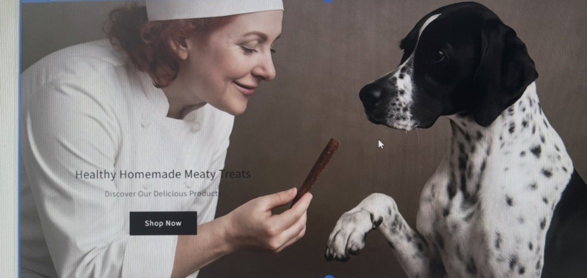 Woman with white headband smiling at a Dalmatian dog, holding a treat or object, in a neutral background.