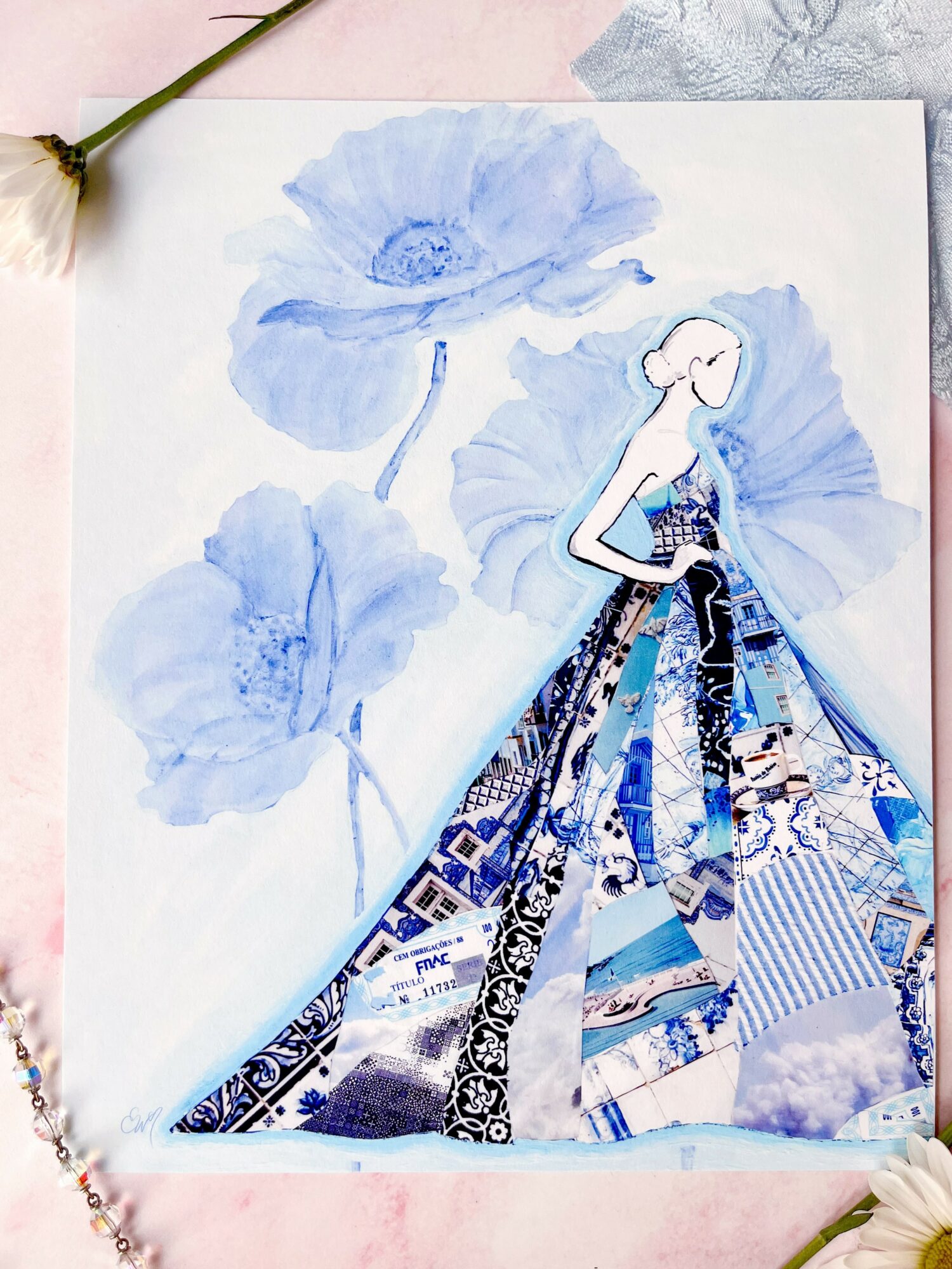 Fashion illustration of a woman in a blue patterned dress, with large blue flowers in the background, on white paper.
