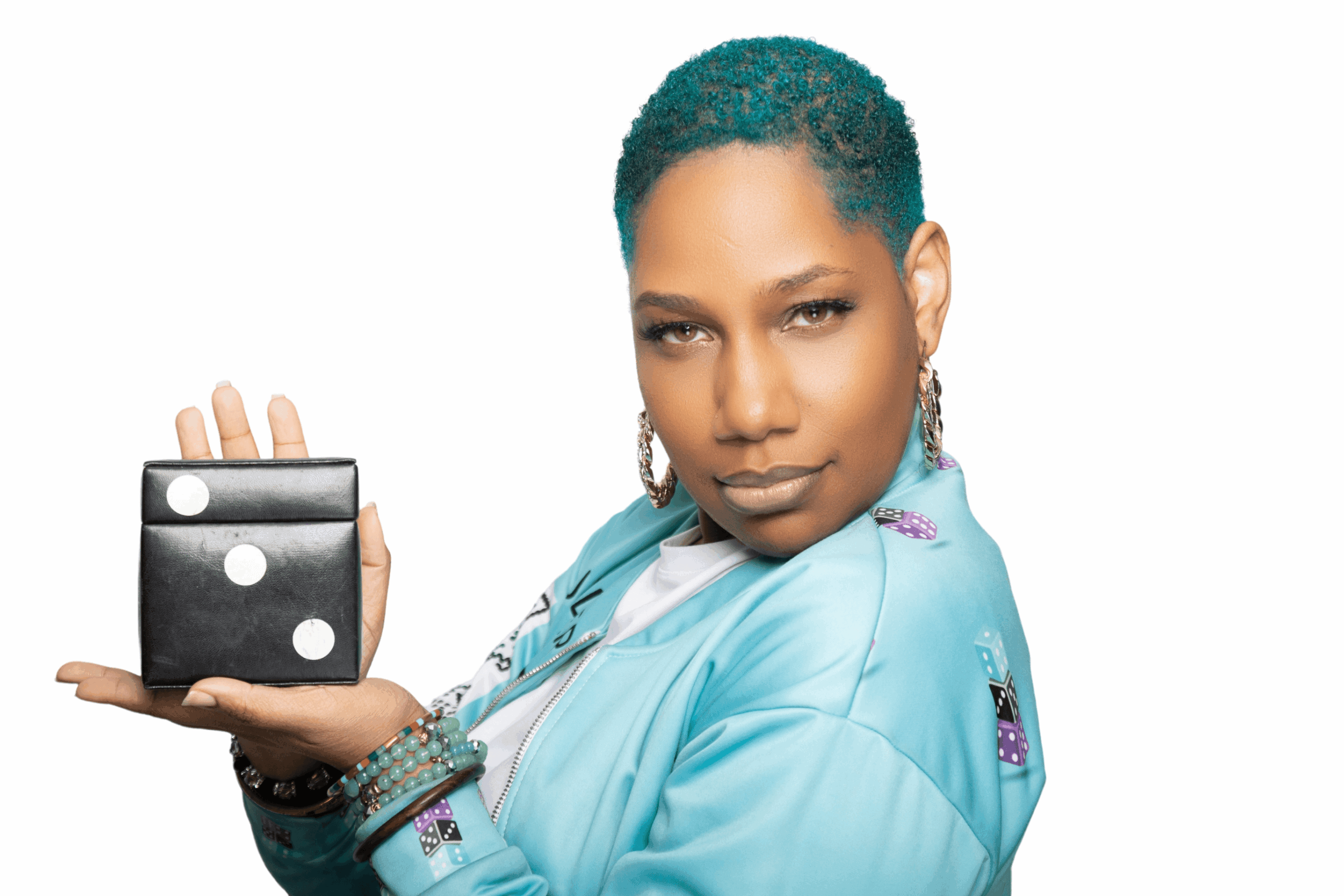 Woman with short hair holding a black wallet with white dots, wearing a light blue jacket and earrings.